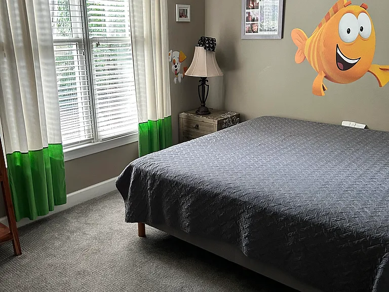 2nd bedroom, also upstairs; King size bed, walk in closet, full bath!