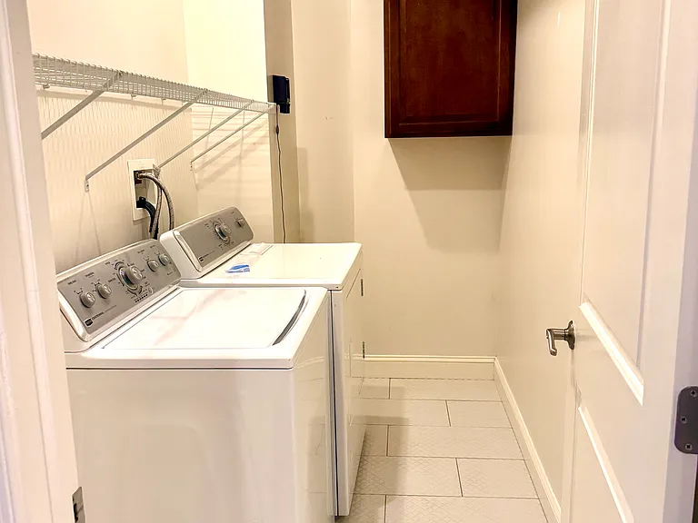 Laundry room with full size washer and dryer