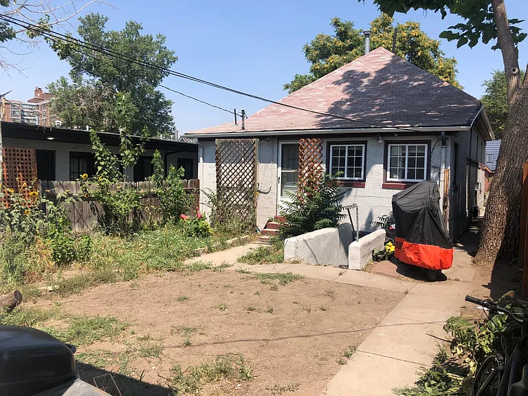 Back yard shared with two other units. Each unit has only one person occupancy at this time. Walk down to basement with storage and laundry.