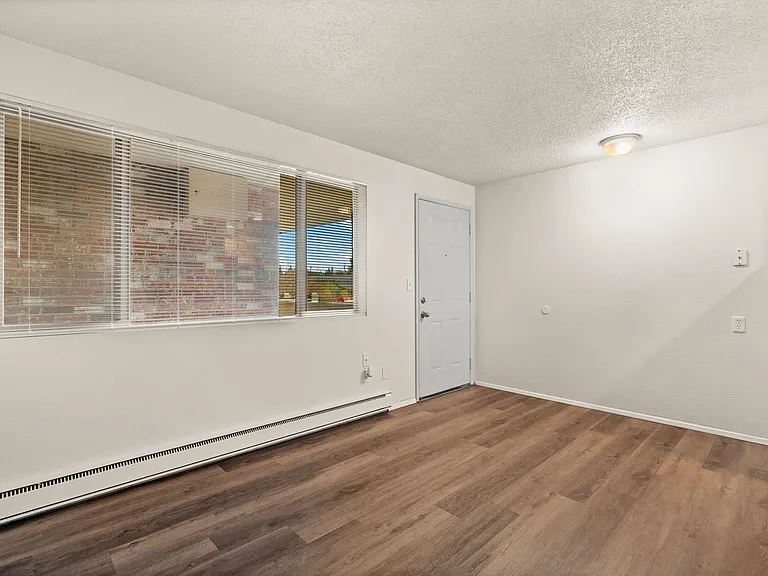 A welcoming living space with natural light, modern flooring, and a clean, open layout. A welcoming living space with natural light, modern flooring, and a clean, open layout.