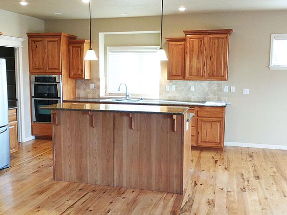 Kitchen with wood floors and walk in pantry