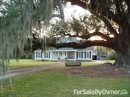 Front of house
						:
						Oak tree approx 200 years old. Stocked(bass-bream) fish pond behind barn.