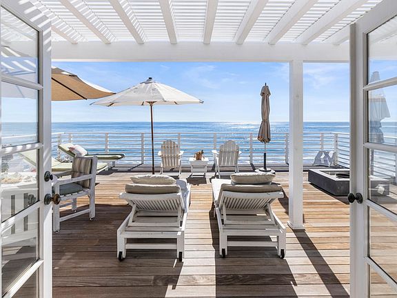 Lounge on the sunny ocean front deck!
