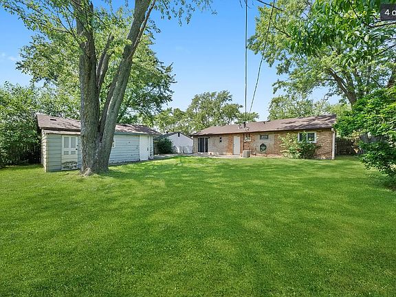 Large gated backyard with detached garage