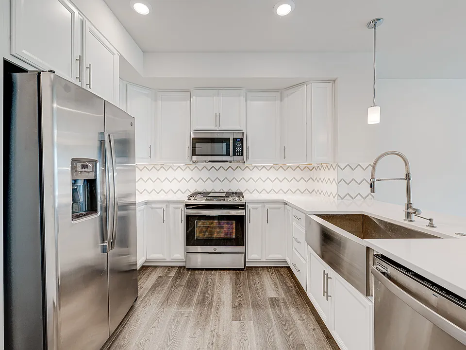 Beautifully upgraded kitchen is immaculate and spacious