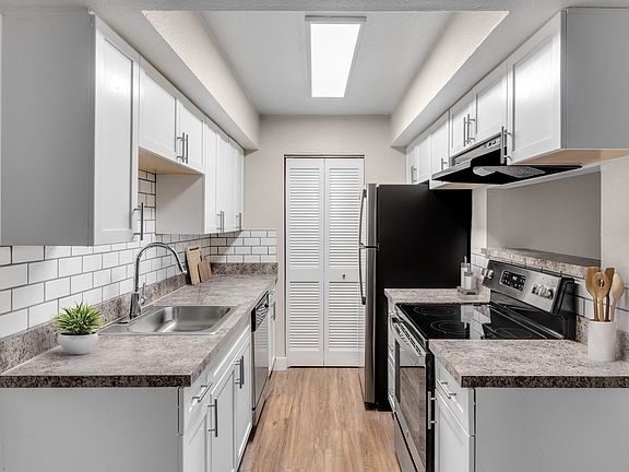 Kitchen with plenty of storage at Verona Apartments in Littleton, CO