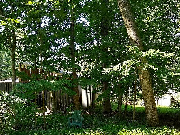 Pretty side view with shed. 