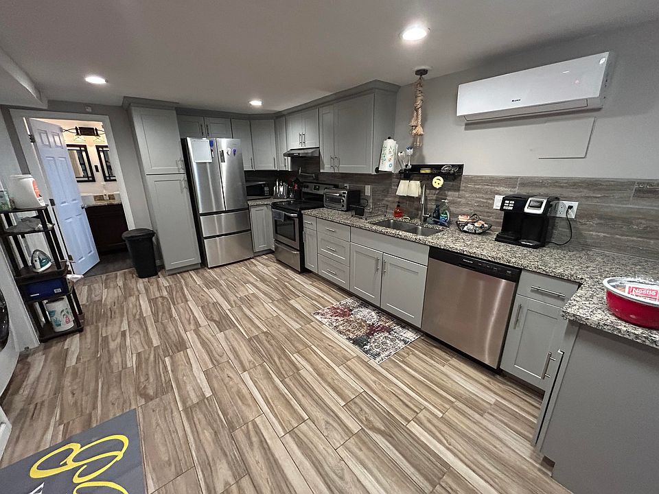 Full kitchen with laundry in unit.