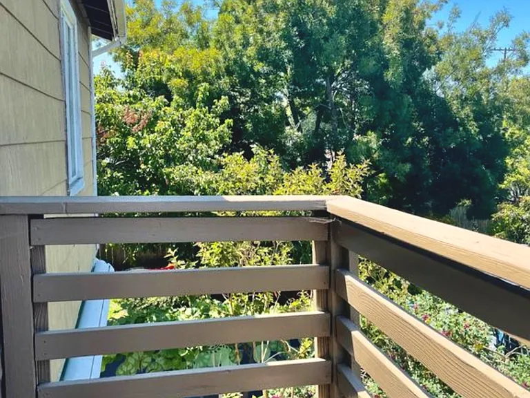 look over the balcony.