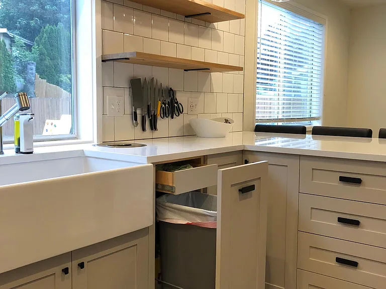 Pull out drawer for garbage and storage