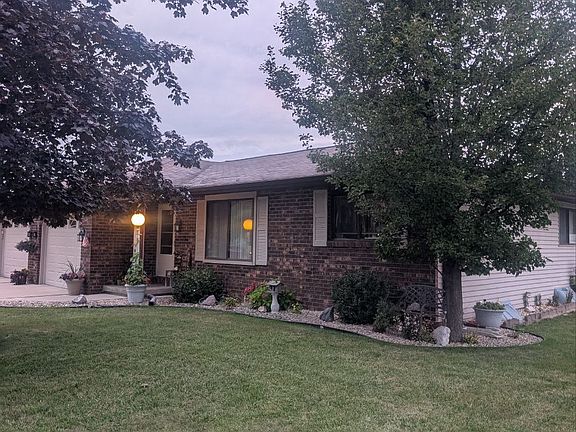 South east view of our professionally landscaped duplex property. Both have excellent lighted frontage