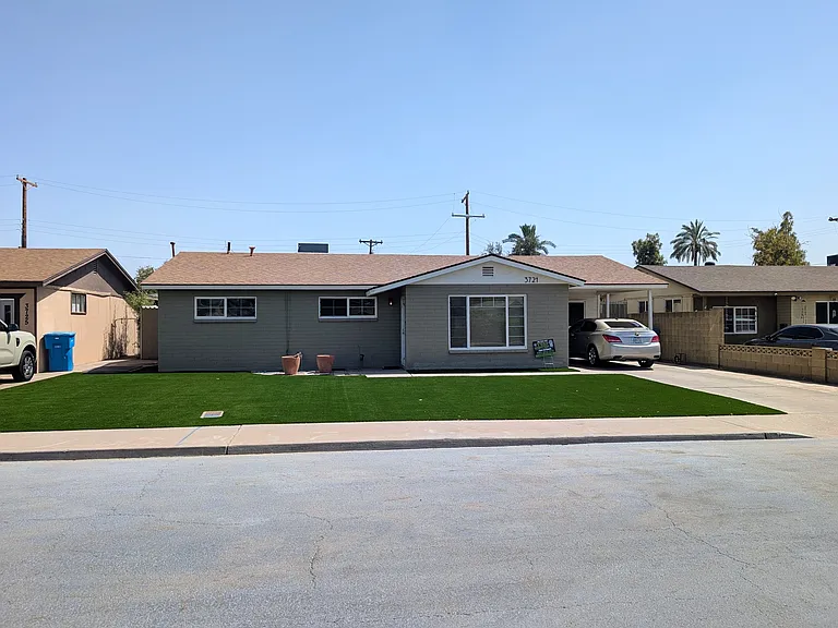 New turf in spacious front yard