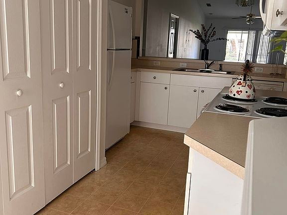Plenty of cabinet space. Dishwasher included as well. Cabinets in terrific condition.