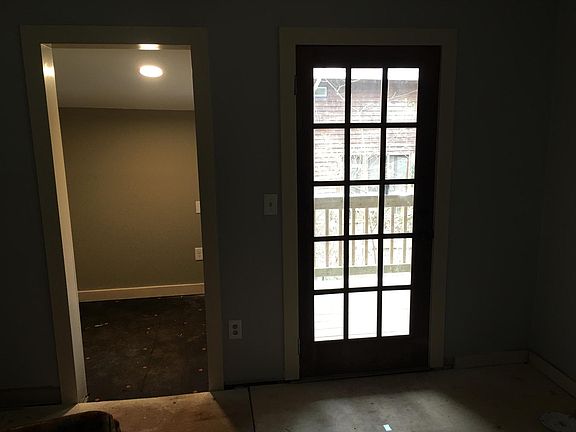 front door, laundry on left