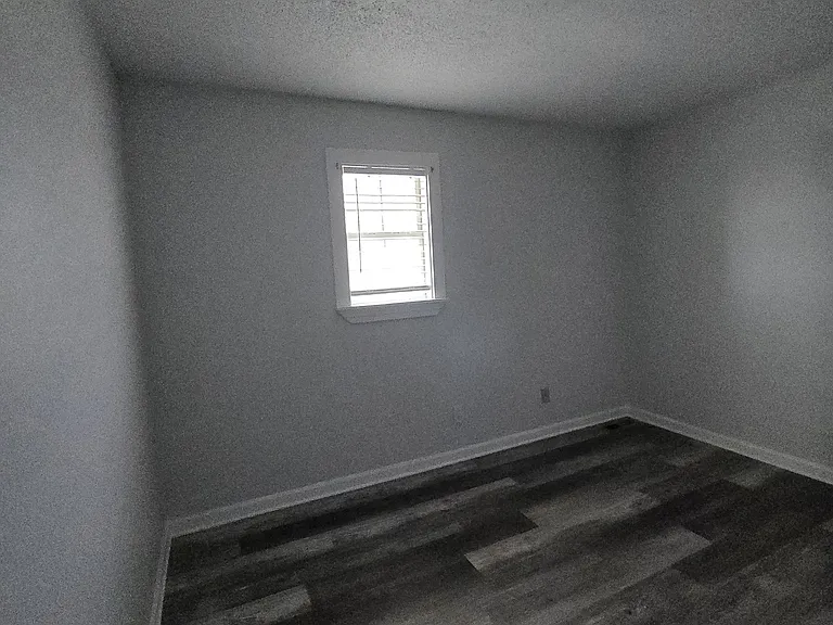Bedroom 1 (ceiling fan not hung in photo-it is rehung, but do not have new picture yet)