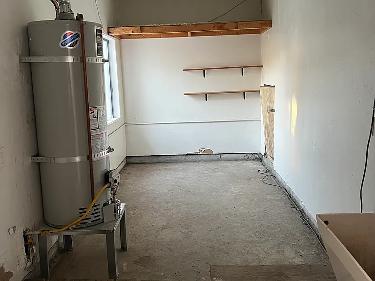 Large Storage/Laundry area with room for workout area