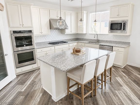 4th image of 8109 Muir Brook Ave