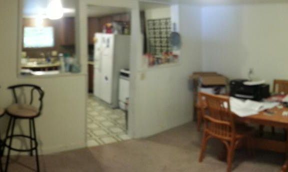 Dining room with Kitchen in background