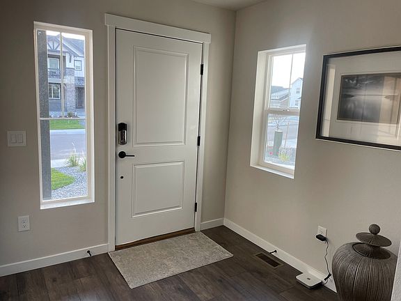 Foyer with vaulted ceiling