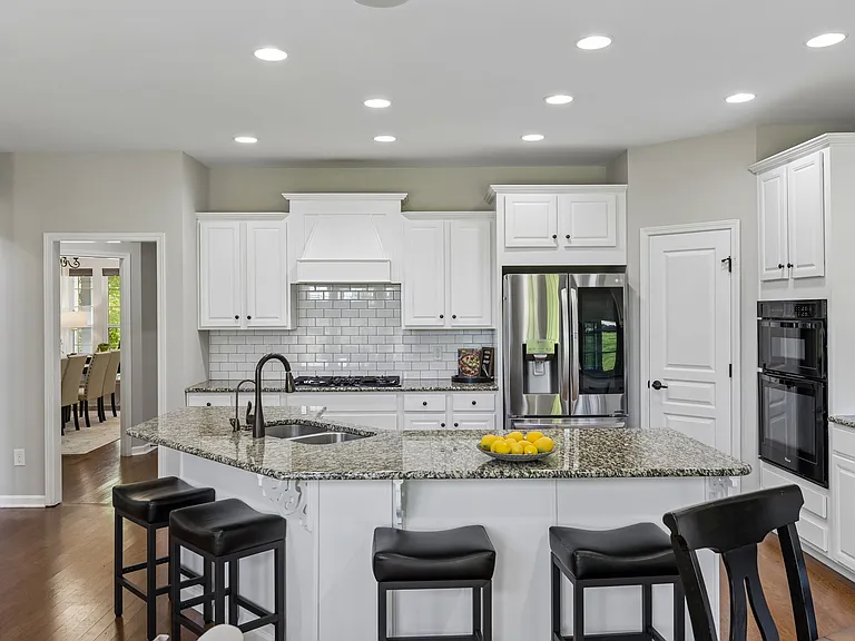 There is seamless flow from the kitchen to the formal dining room.