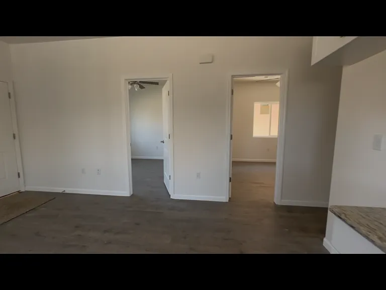 TWO BEDROOMS NEXT TO THE KITCHEN/LIVING ROOM
