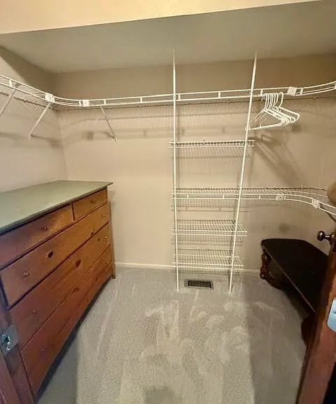 Primary Bedroom Walk-In Closet.