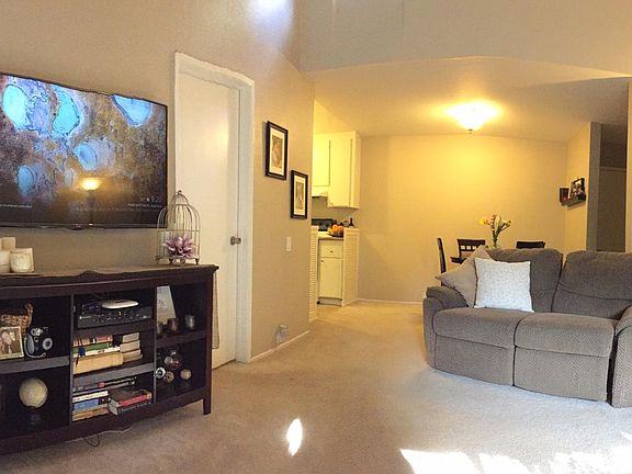 Family and Dining room looking out of large sliding glass door