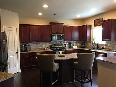 Stainless steel appliances and granite countertops