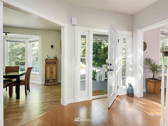 Gracious entry with new wood flooring 