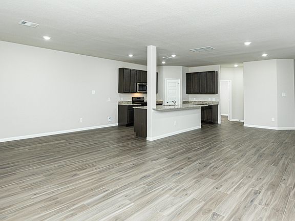 Family Room to Dining Area and Kitchen