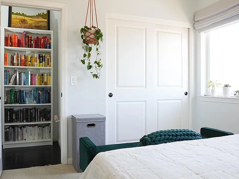 2nd floor primary bedroom, with large closet, view to landing