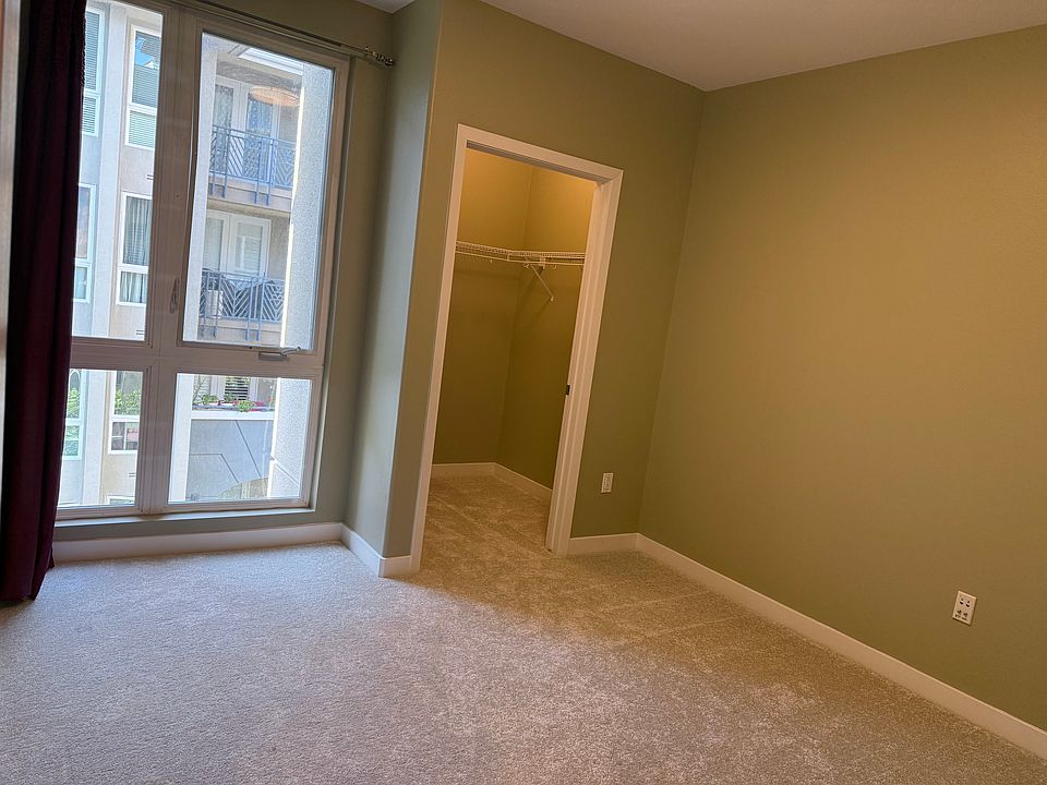 Bedroom three with walk-in closet.