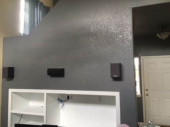 Entertainment center wired for surround sound