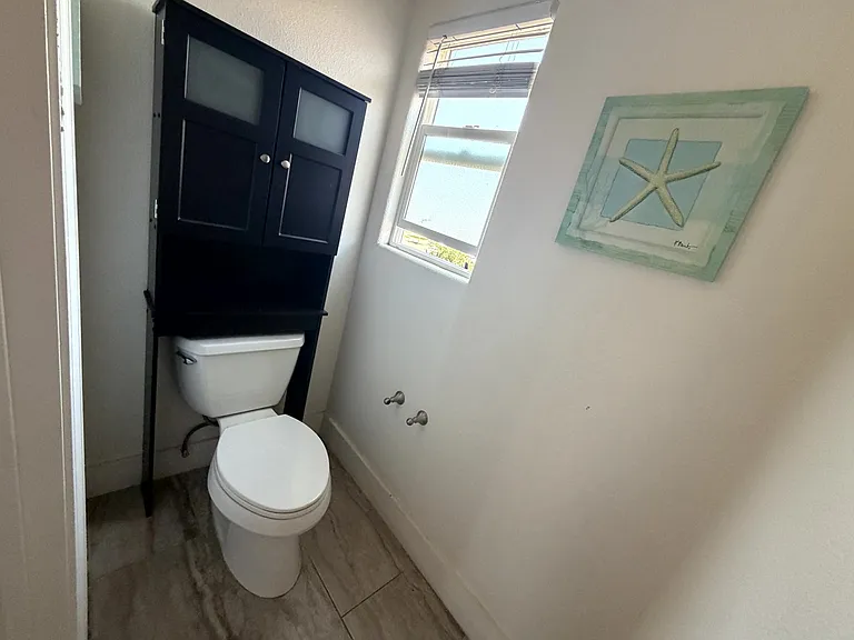 Separate toilet room for added privacy.