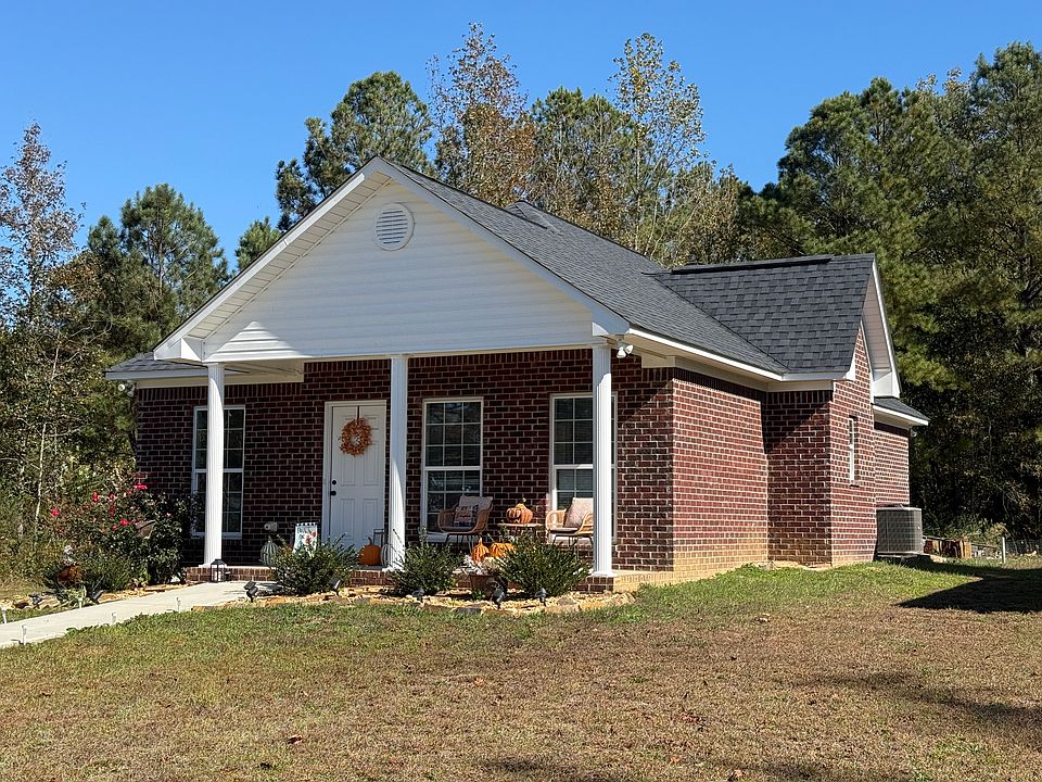 Front of Home, Spacious front porch, rock landscaping