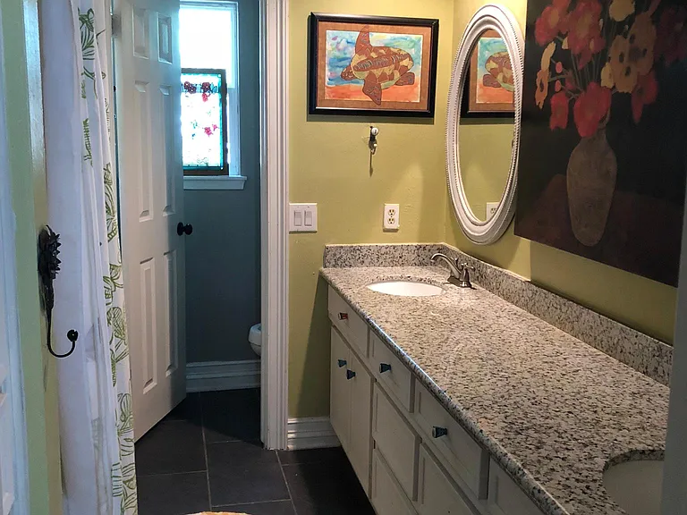 Upstairs Full Bathroom. 2 Sinks and Walk-in Shower / Bath.