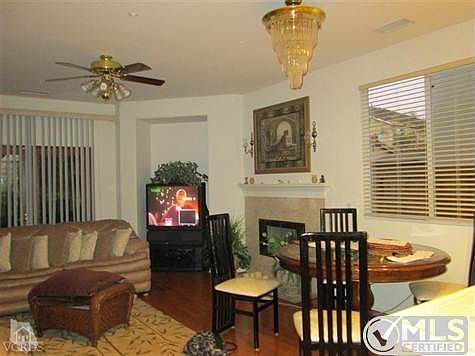 Den with Fireplace and eating area