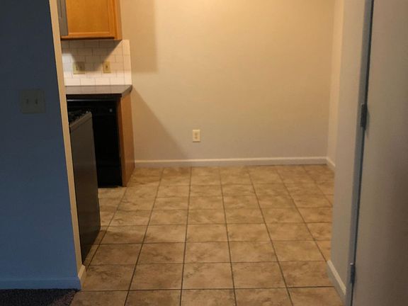 Dining Space + Entry- Be Welcomed with Beautiful Tile Floors!