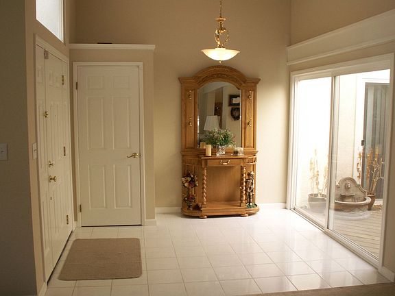 Large formal entry way opens to atrium