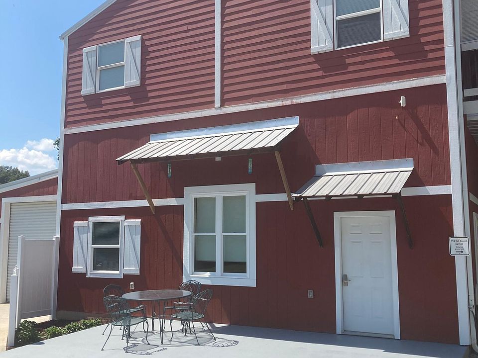 Front entrance with private seating area, parking area for up to 2 vehicles