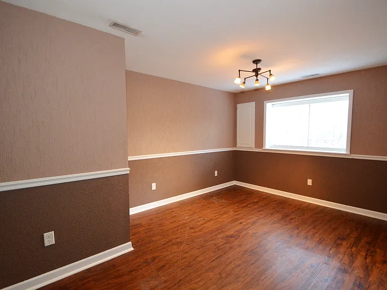 Family room w/ designer paint and textured walls.