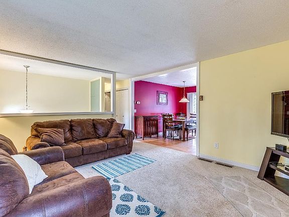 Large, open living room on the upper level.