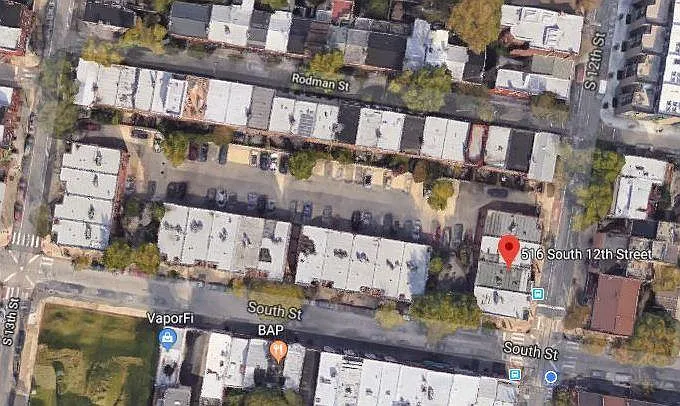Bird's eye view of 516 South 12th (which is the rental), plus 518 South 12th (where the owner, Robert, lives), and patio area behind the units, and a portion of the gated parking lot.