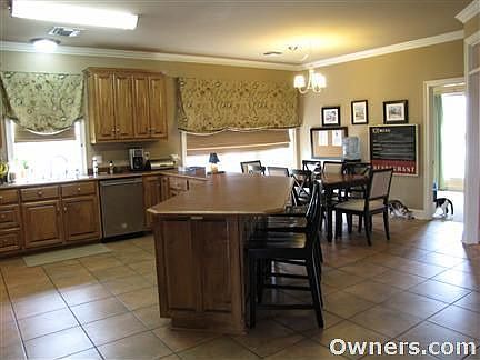Large kitchen with eat in area