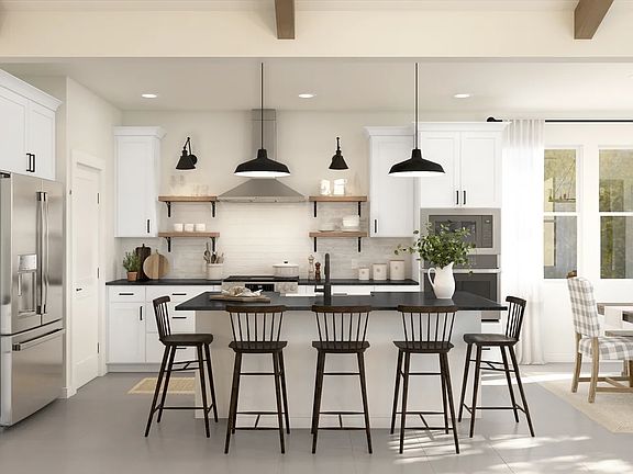 Kitchen with pendant lighting and floating shelves