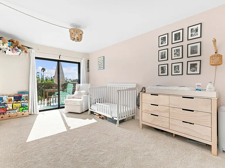 Guest bedroom with slider out to balcony