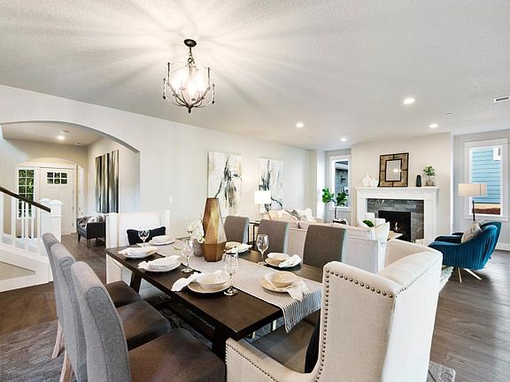 Open-concept dining and living space is perfect for entertaining