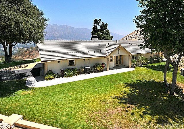 Large grassy front yard