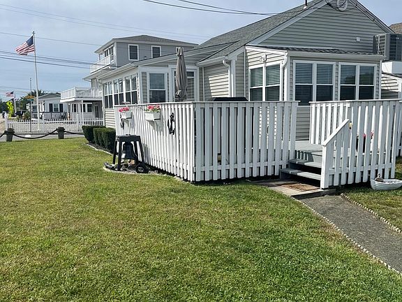 Front lawn with massive deck