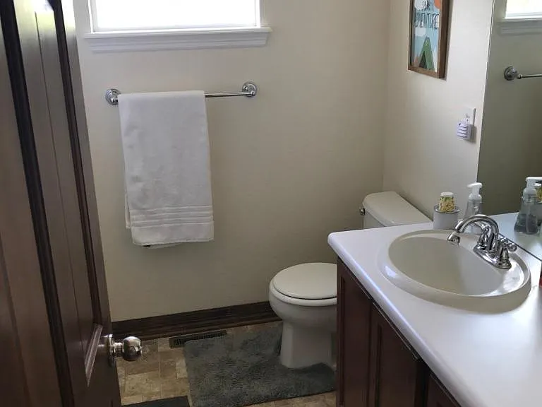 secondary bathroom outside of the secondary bedrooms